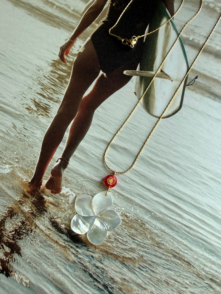 Lara L Plumeria tide necklace