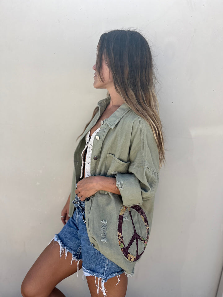 She is a Surfer Green Jacket